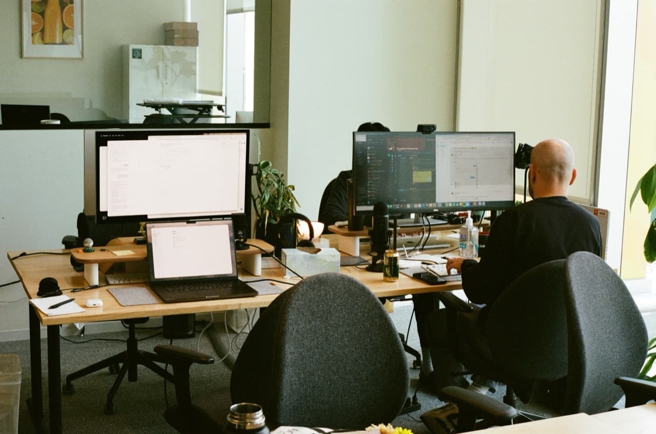 The team at their desks during a working session.